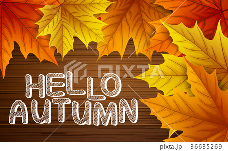 Autumn leaves with lettering on wooden background 36635269