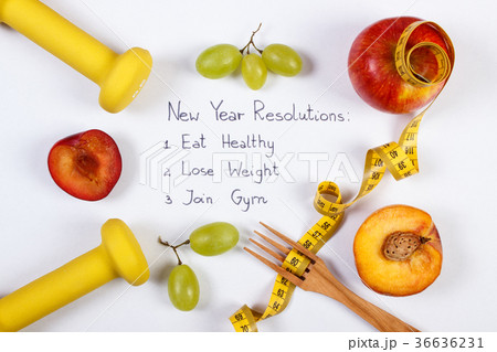 New year resolutions, fruits, dumbbells centimeter New year resolutions, fruits, dumbbells centimeter 36636231