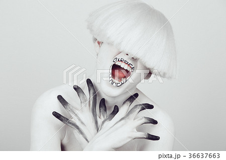 A girl with white skin and a white wig with an 36637663