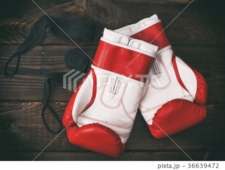 a pair of leather red boxing gloves a pair of leather red boxing gloves 36639472