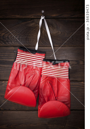 pair of old leather boxing gloves 36639473