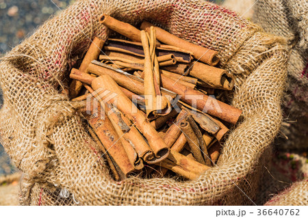 Bag of Cinnamon sticks background at market 36640762