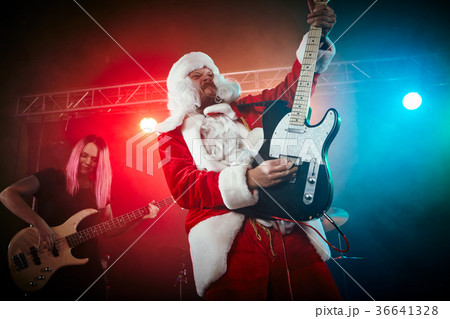 Santa Claus plays rock. Santa Claus plays rock. 36641328