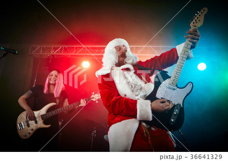 Santa Claus plays rock. Santa Claus plays rock. 36641329
