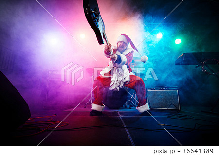 Santa Claus plays rock. Santa Claus plays rock. 36641389