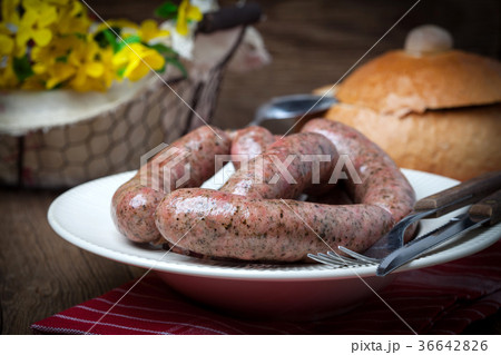Raw white sausage. 36642826