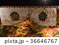 sacred cloth hanging top of temple gate  36646767