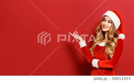 Beautiful alluring model in Christmas costume Beautiful alluring model in Christmas costume 36651053