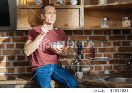 Positive delighted male person having idea Positive delighted male person having idea 36653621