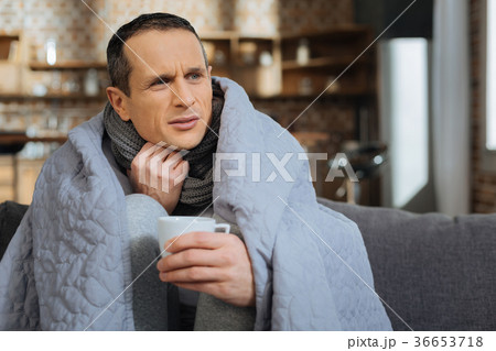 Attractive young man having flue 36653718