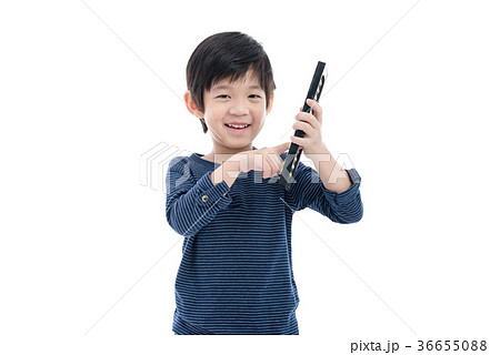 Asian child holding Soroban abacus 36655088