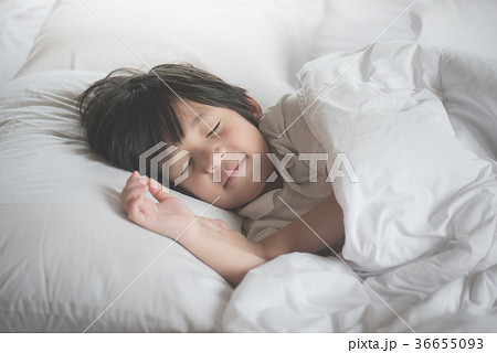 Cute asian child sleeping on bed 36655093