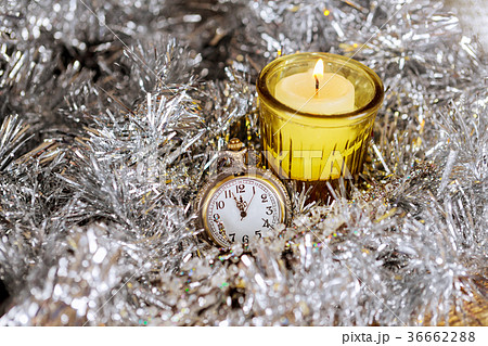 Christmas eve background candle clock new year Christmas eve background candle clock new year 36662288