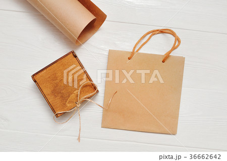 Vintage package and wooden box with wrapping kraft Vintage package and wooden box with wrapping kraft 36662642