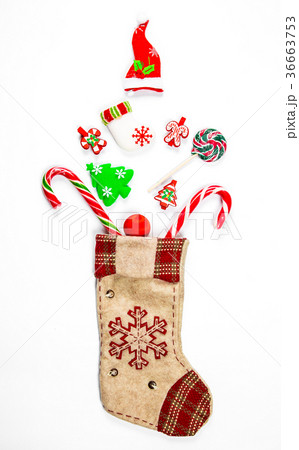 Christmas background with a sock from which  36663753