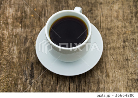 Cup of coffee on wooden table 36664880