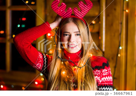 Beautiful girl with festive lights 36667961