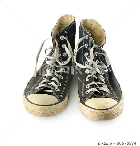 Old worn sneakers isolated on white background. 36670574