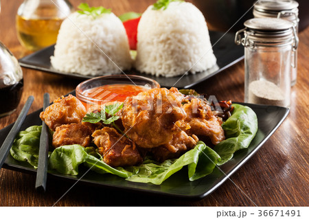 Fried chicken pieces in batter 36671491