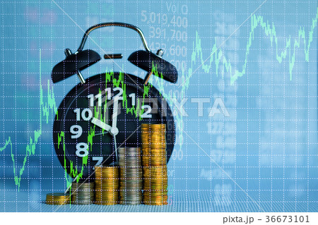 alarm clock and step of coins stacks with graph alarm clock and step of coins stacks with graph 36673101