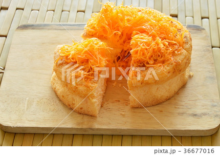 golden egg threads cake cut for piece  36677016