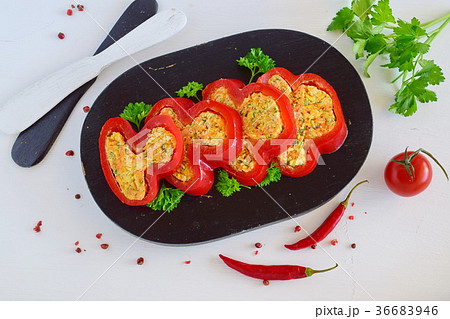 Paprika stuffed with mix of carrot, cheese, garlic 36683946