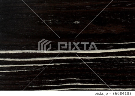 Exclusive black wood texture with white stripes. Exclusive black wood texture with white stripes. 36684183