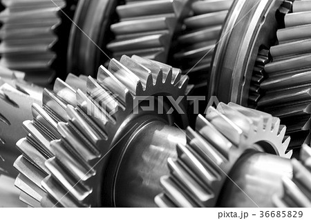 Gear wheel parts new car removed close-up 36685829