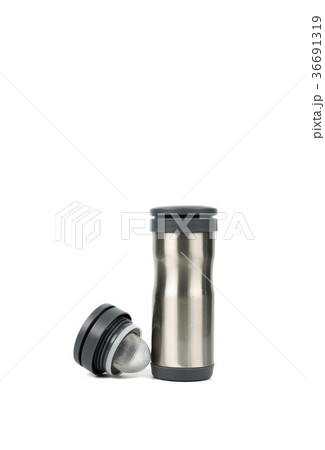 Silver thermos bottle with opened cap on white  36691319