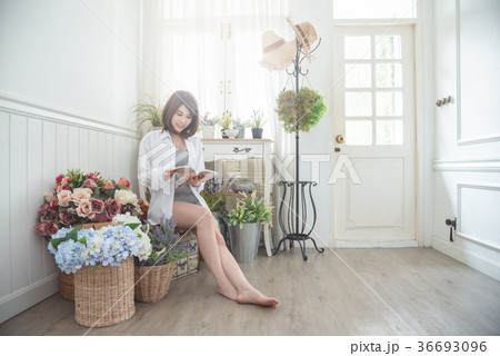 Beautiful girl reading book at home 36693096