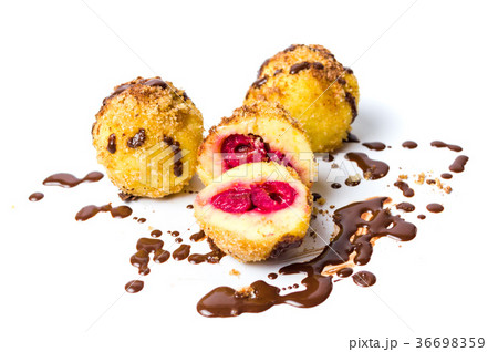 Bread crumb dumplings with cherry isolated Bread crumb dumplings with cherry isolated 36698359