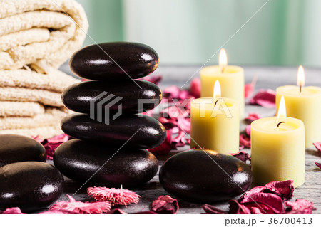 Spa still life with hot stones and candles 36700413