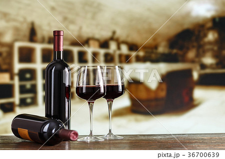Wine cellar with wine bottle and glasses 36700639