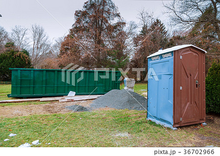 Over flowing Dumpsters being full with garbage 36702966