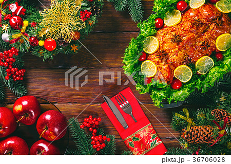 Christmas table dinner time with roasted meats  36706028