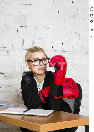 Young blond beauty businesswoman sitting at a Young blond beauty businesswoman sitting at a 36706150