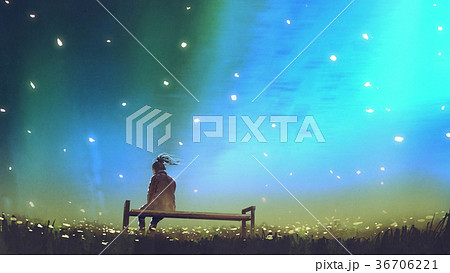 young woman sitting on a bench against the sky 36706221