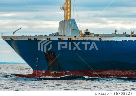 Blue cargo ship underway 36708227