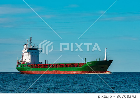 Green cargo ship 36708242