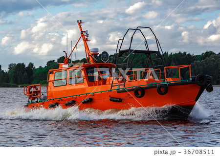 Orange pilot boat in action 36708511