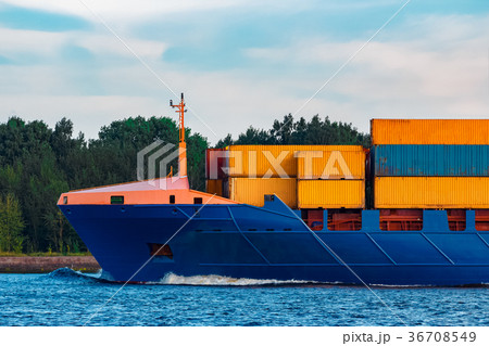 Blue container ship underway 36708549