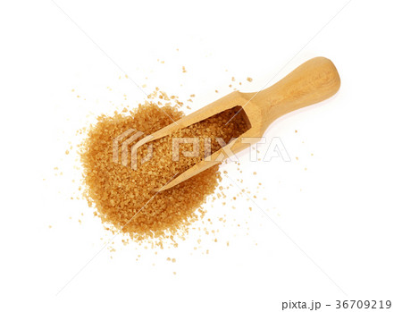 Wooden scoop spoon full of brown cane sugar Wooden scoop spoon full of brown cane sugar 36709219