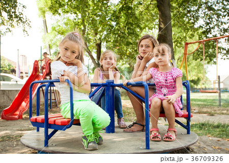 Kids on the carousel  36709326