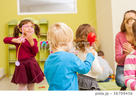 Group of little children dancing Group of little children dancing 36709456