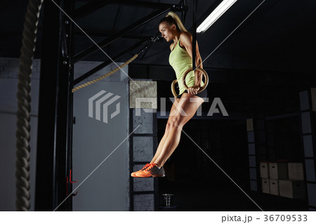 Female fitness athlete exercising 36709533