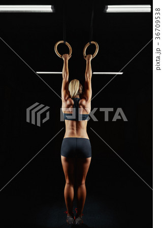 Female fitness athlete exercising Female fitness athlete exercising 36709538