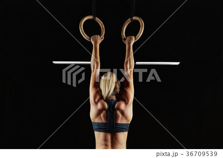 Female fitness athlete exercising Female fitness athlete exercising 36709539