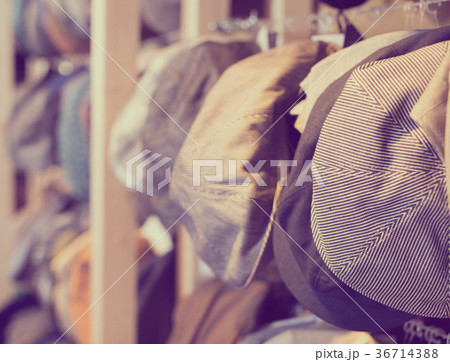newboys cap hats hanging on the wall in mall newboys cap hats hanging on the wall in mall 36714388