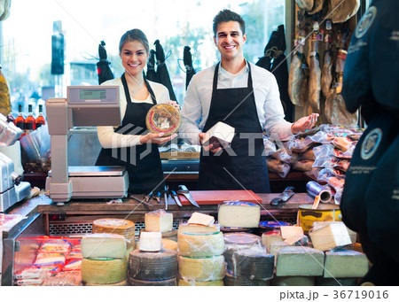 sellers offering cheese 36719016