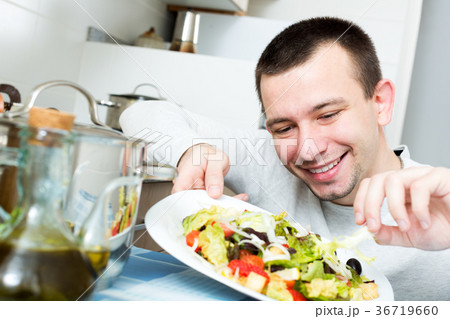 Portrait of male with vegetables dish 36719660